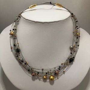 Layered wire neckpiece